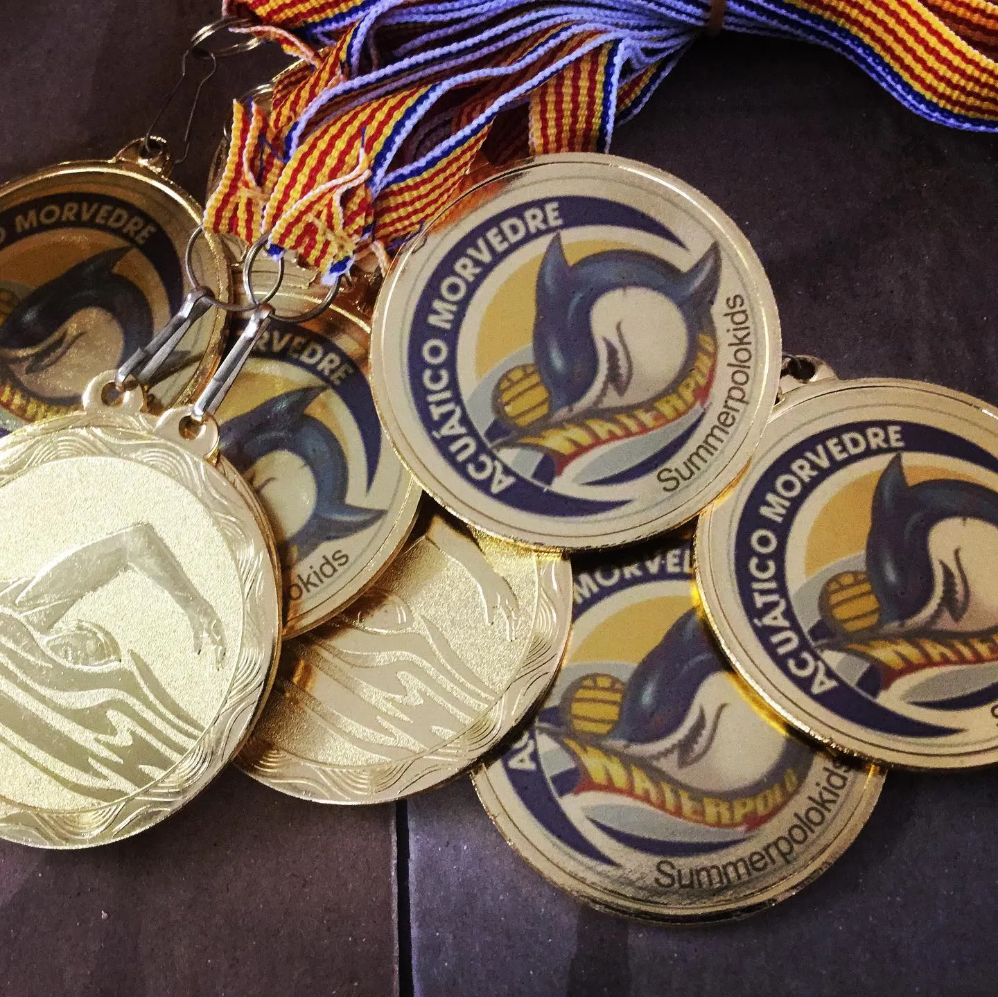 medalla club acuático